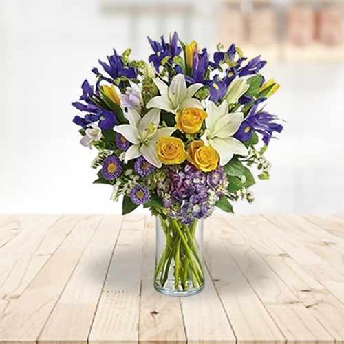 Premium Seasonal Flowers In Glass Vase