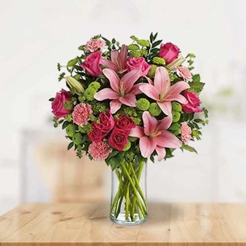 Deluxe Seasonal Flowers In Stylish Vase