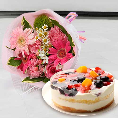 Bright Flower Arrangement With Cake